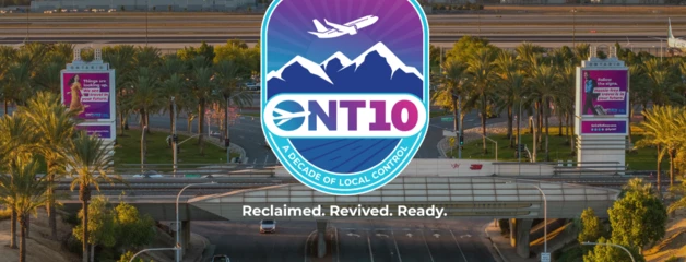 An aerial shot from ONT looking toward the mountains has a logo that says ONT 10, A Decade of Local Control, Reclaimed. Revived. Ready.