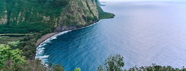 Photo of Hawaii with an ocean and cliff view 