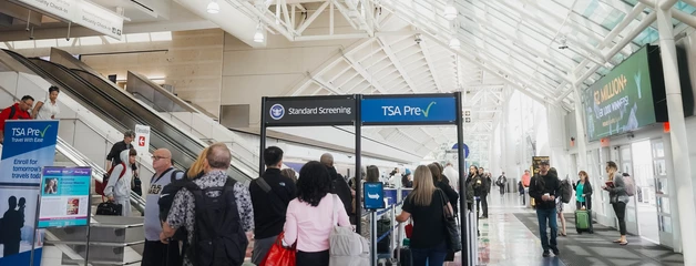 TSA line gathers in ONT terminal.