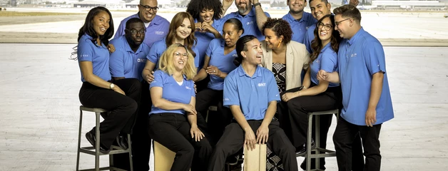 Customer Experience Team posing or a photo with smiling faced