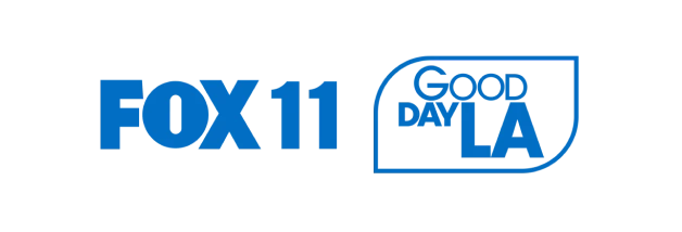 FOX 11 logo with "Good Day LA" text in blue and white design.