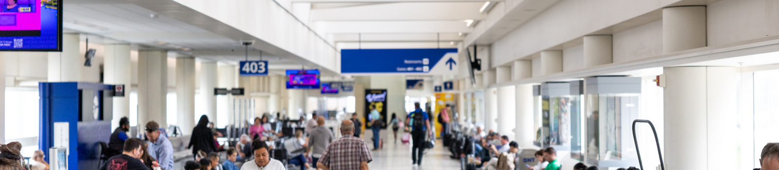 Passengers walking through terminal